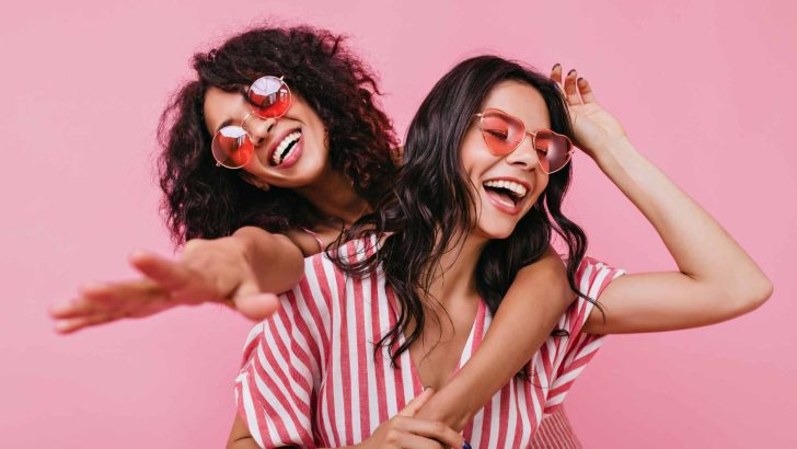 Two friends laughing together